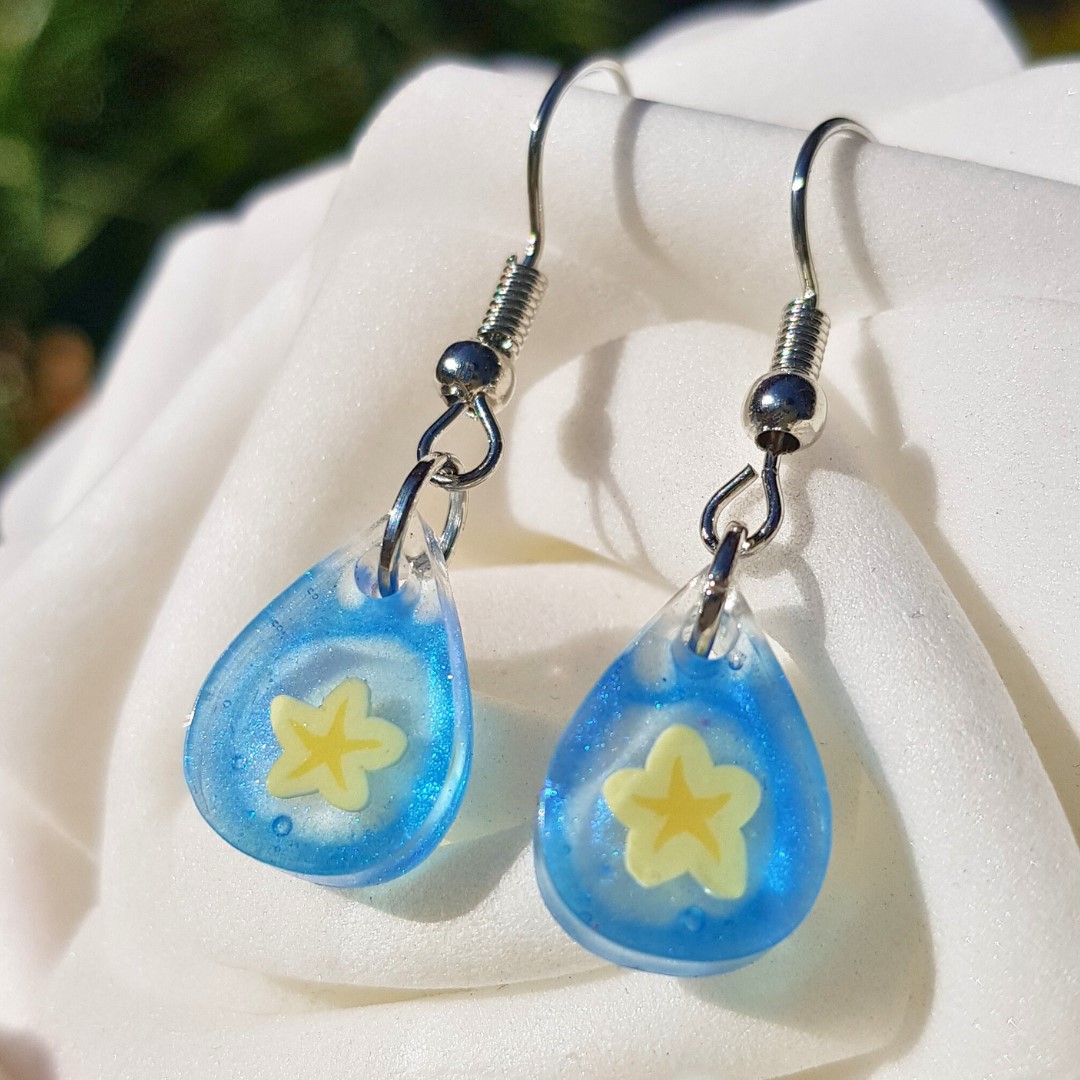 Handmade Blue Resin Droplet Earrings with Yellow Star Flower