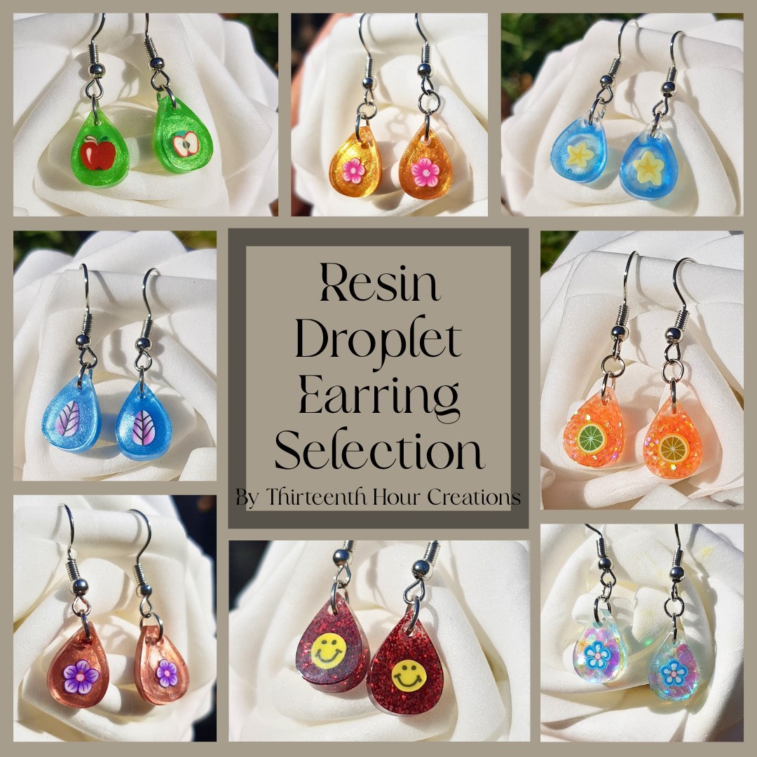 Handmade Blue Resin Droplet Earrings with Yellow Star Flower - Image 3